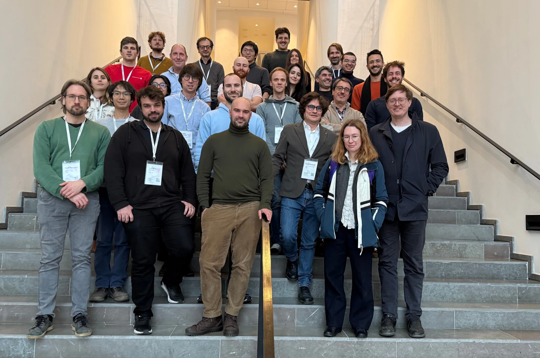 Participants in the inaugural Emergent Geometries workshop gathered on a staircase
